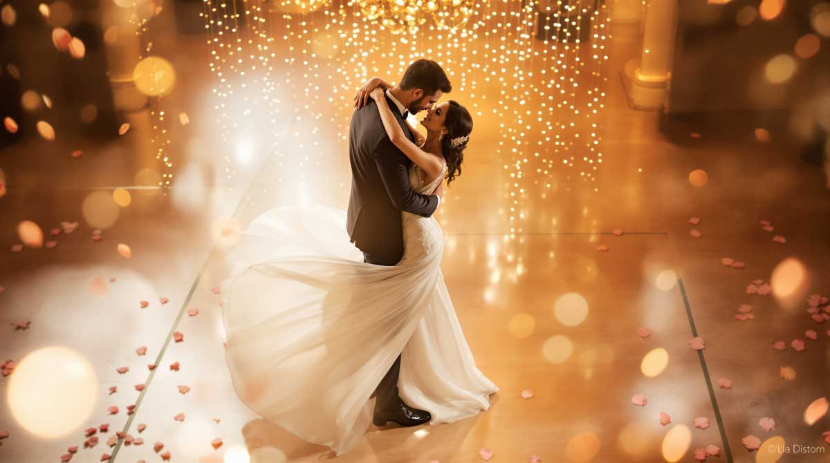 A Bride and Groom Dance at their Wedding Reception