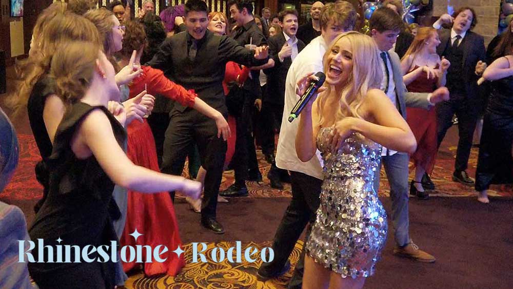 Rhinestone Rodeo Interacting on the Dance Floor with Guests
